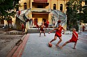 Steve McCurry, Monks Play Soccer
2010, FujiFlex Crystal Archive Print