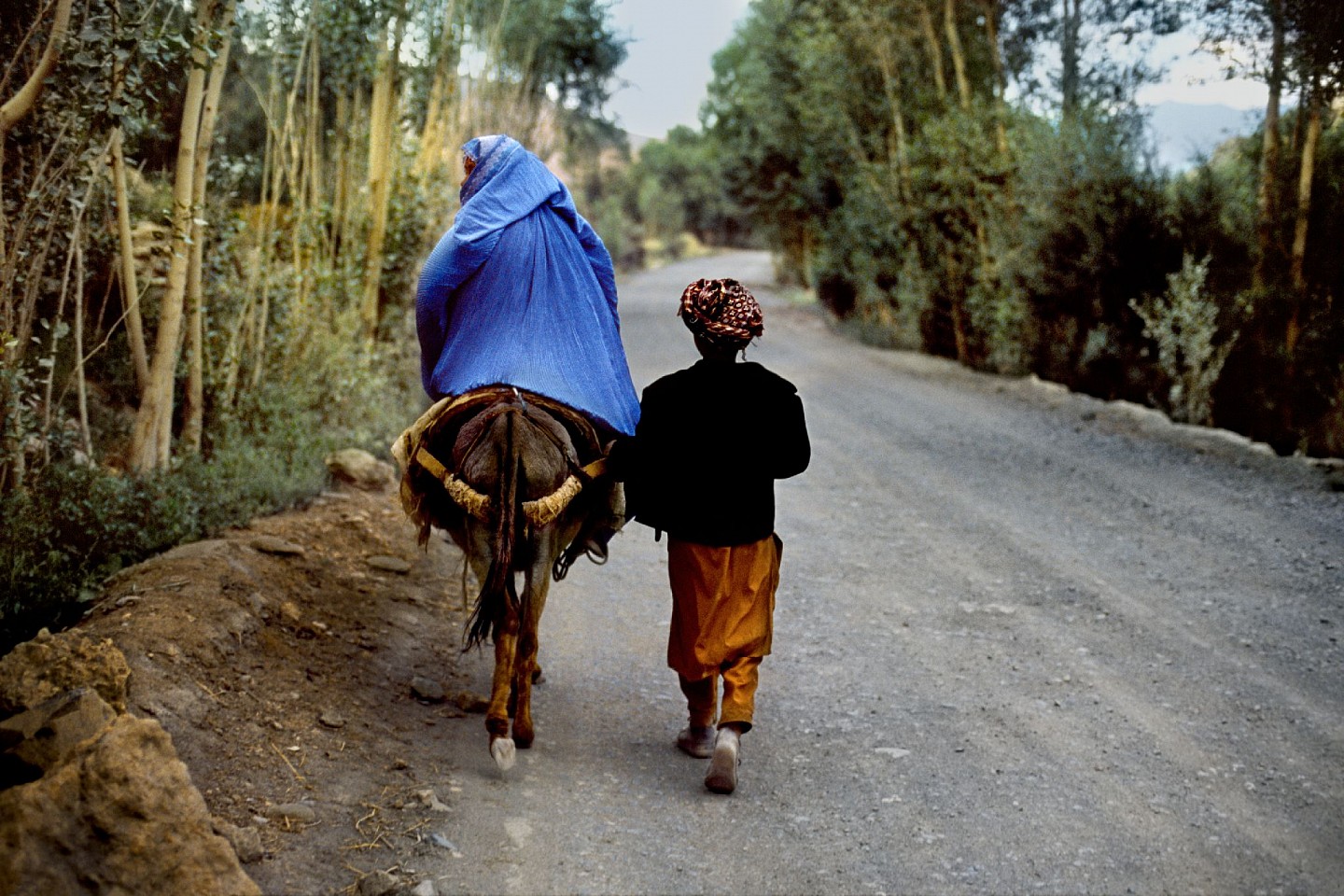 Steve McCurry, Mother and Son Return Home, 2006
FujiFlex Crystal Archive Print
Price/Size on request