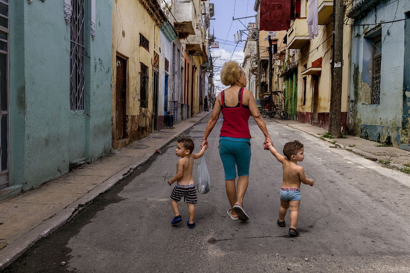 Steve McCurry, Mother and Sons Walk Hand in Hand, 2019
FujiFlex Crystal Archive Print
Price/Size on request